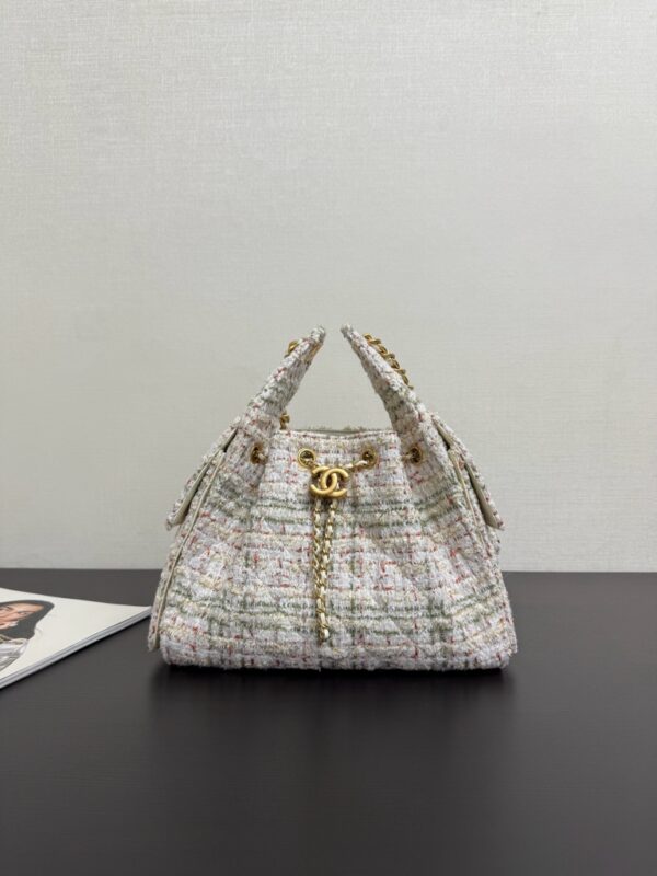 In stock! Bucket bag with drawstring. Tweed fabric. Small size.