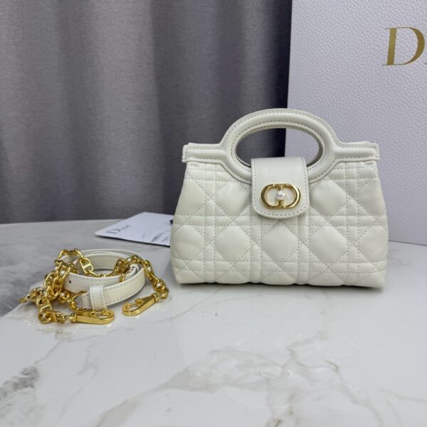 This Dior Jolie Top Handle mini chain bag is a new product of the Spring 2026 ready-to-wear collection.